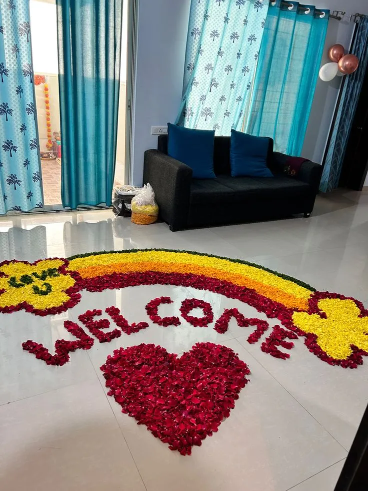 A heart and celebratory message made from flower petals
